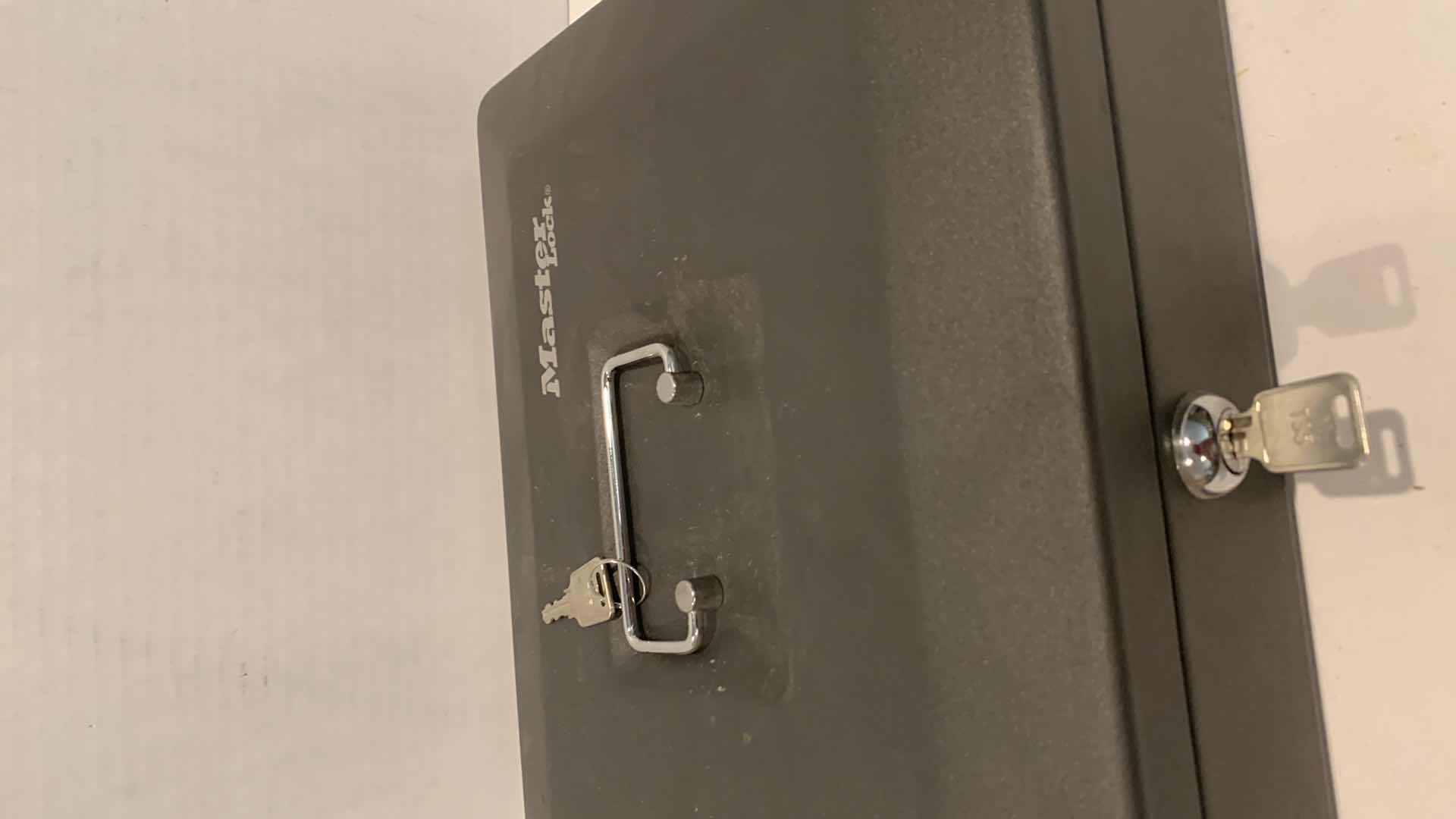 Photo 1 of MASTER LOCK CASH BOX WITH KEY 12” X 10” H 4”