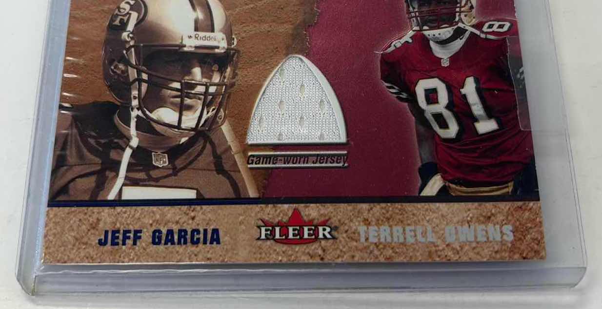 Photo 1 of 2002 TERRELL OWENS AND JEFF GARCIA FLEER CLASSIC COMBINATIONS GAME JERSEY CARD