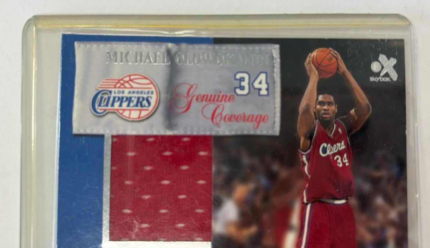 Photo 1 of 2000 MICHAEL OLOWOKANDI CLIPPERS SKYBOX GENUINE COVERAGE