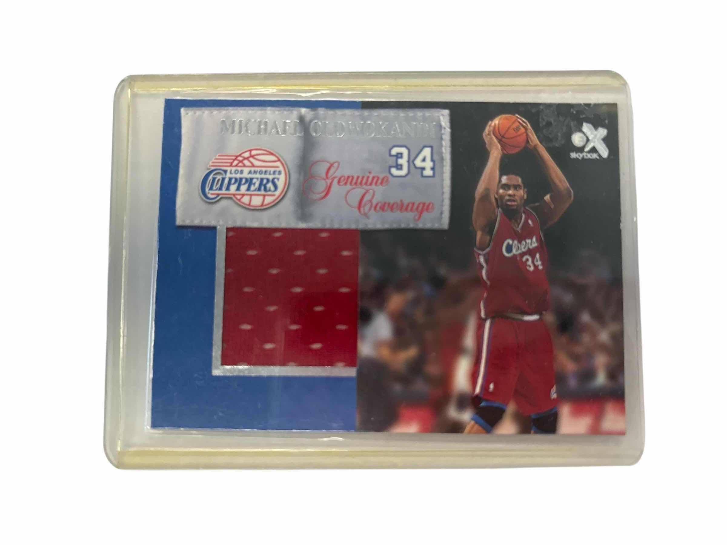 Photo 1 of 2000 MICHAEL OLOWOKANDI CLIPPERS SKYBOX GENUINE COVERAGE