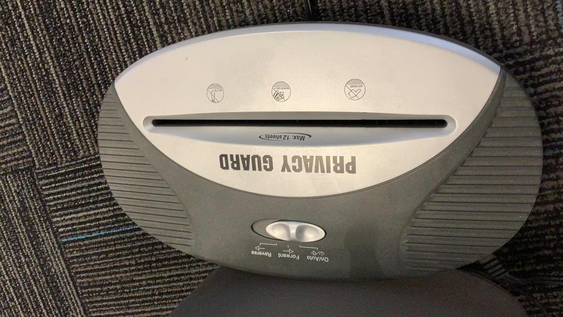 Photo 2 of PRIVACY GUARD PAPER SHARED