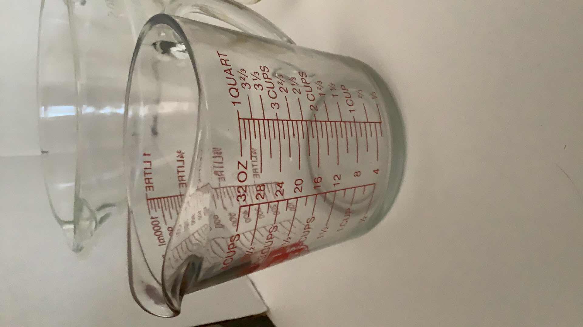 Photo 2 of KITCHEN GLASS MEASURING CUPS AND PANS