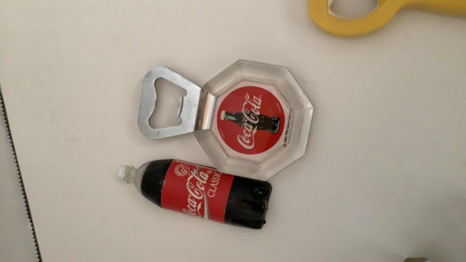 Photo 3 of ASSORTED BOTTLE OPENERS AND BUTTER KNIVES AND MAGNETS