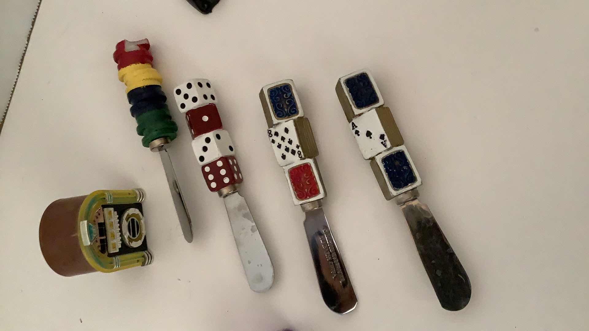 Photo 4 of ASSORTED BOTTLE OPENERS AND BUTTER KNIVES AND MAGNETS