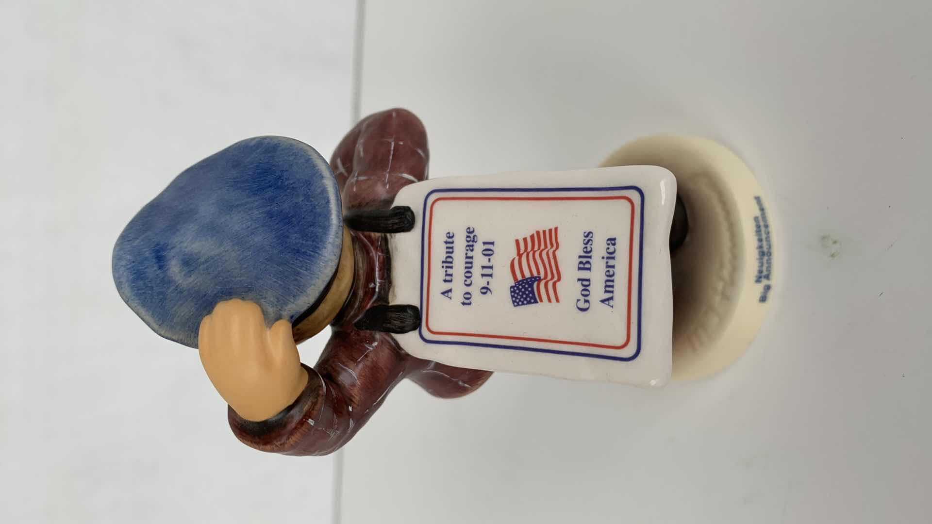 Photo 1 of HUMMEL BOY WEARING GOD BLESS AMERICA SIGN