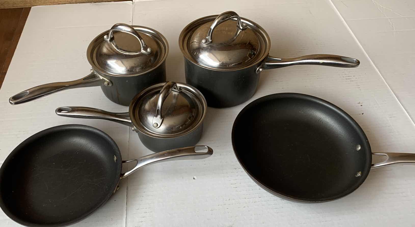 Photo 1 of 3 KIRKLAND SIGNATURE SAUCEPANS WITH LIDS, AND 2 CUISINART SKILLETS