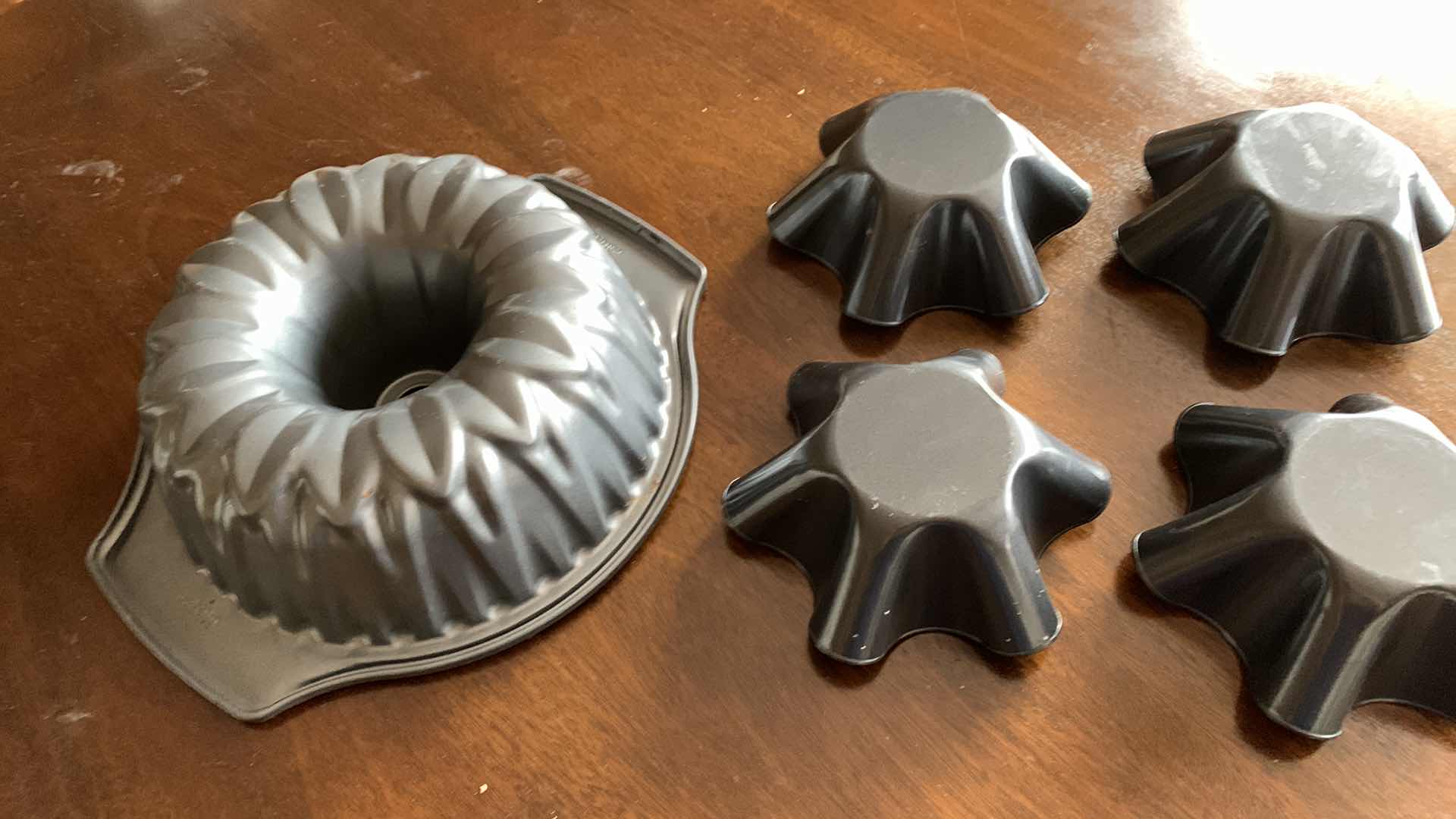 Photo 1 of BUNDT PAN AND 4 TOSTADA MOLDS