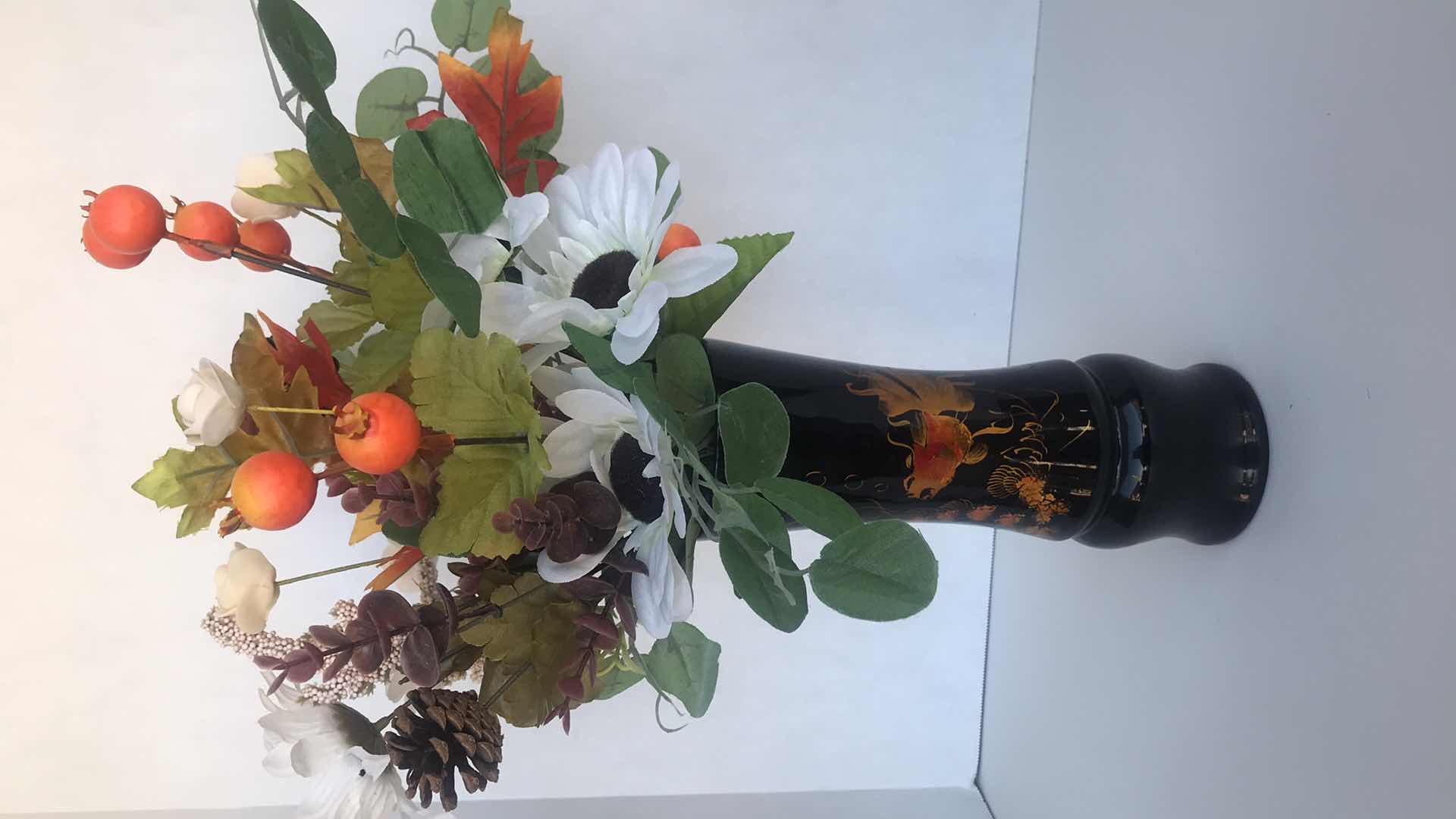 Photo 1 of ORIENTAL DESIGN, FISH ON BLACK PLASTIC VASE, WITH ARTIFICIAL FLORAL ARRANGEMENT