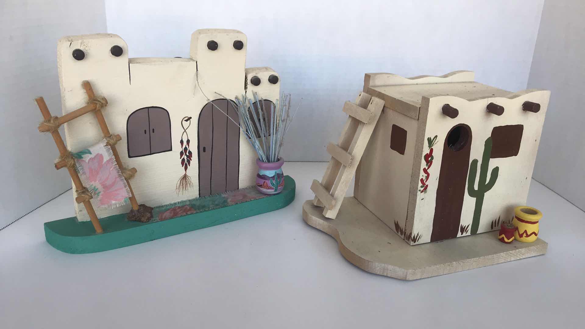 Photo 1 of HANDCRAFTED WOODEN MEXICAN ART,  8 1/2” TALL, SET OF TWO