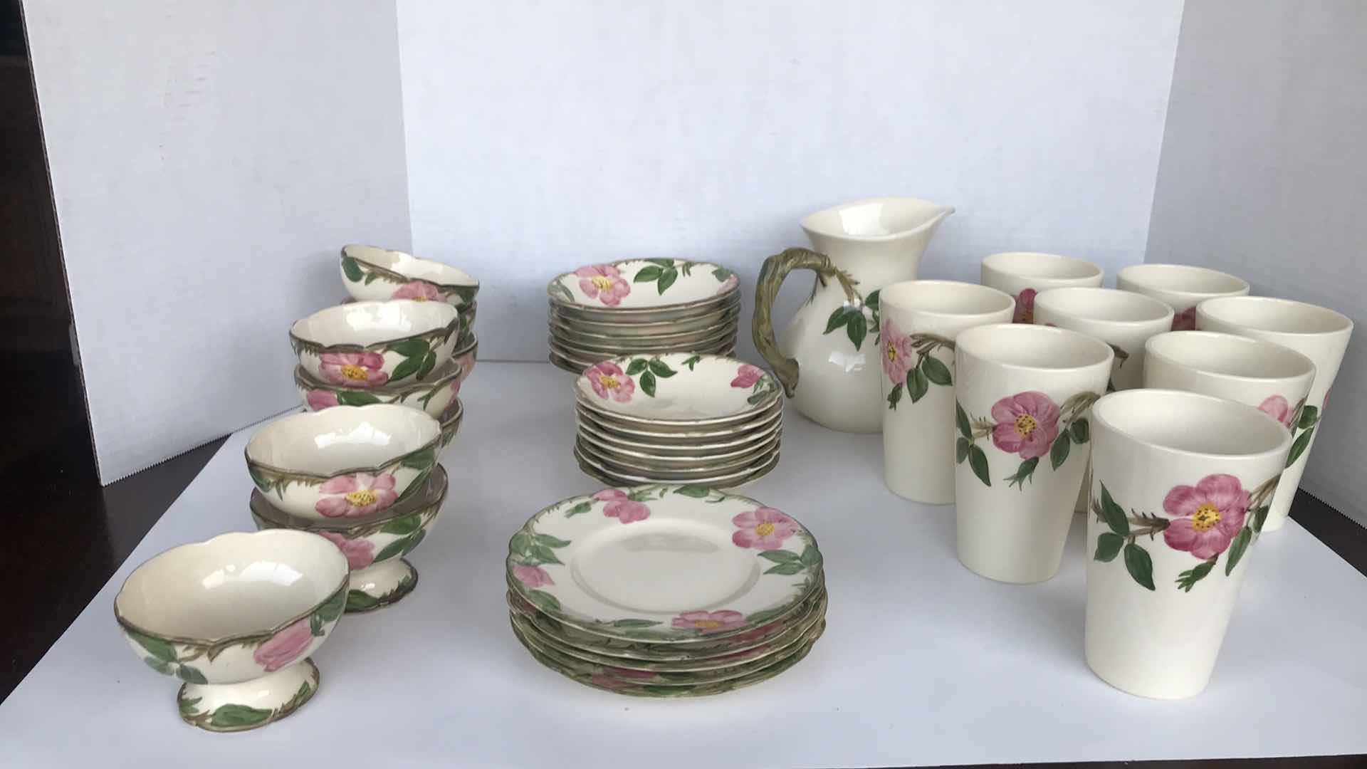 Photo 1 of FRANCISCAN DESIGN, 8 WATER CUPS, WATER PITCHER, 9 SMALL DESSERT BOWLS, 7 MEDIUM DESSERT BOWLS, 7 LARGER DESSERT BOWLS, AND 5 SAUCERS FOR ALL DESSERT BOWLS