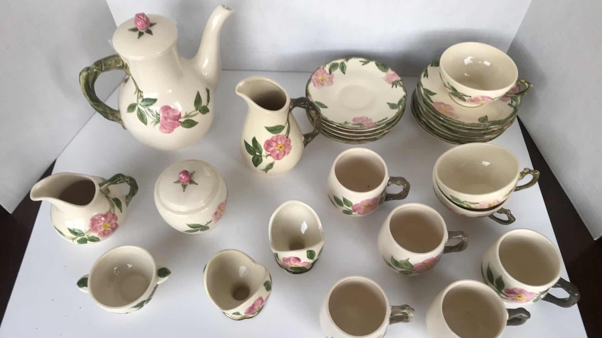 Photo 1 of FRANCISCAN DESIGN COFFEE AND TEA SERVICE (INCOMPLETE SET) - 13 SAUCERS, 5 DEMITASSE COFFEE CUPS, 3 TEACUPS, 3 SUGAR BOWLS (ONE WITH LID), 2 CREAM PITCHERS, ONE COFFEE POT