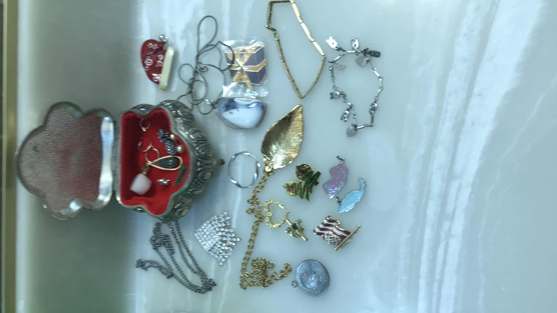 Photo 1 of ASSORTED JEWELRY IN SMALL SILVER BOX