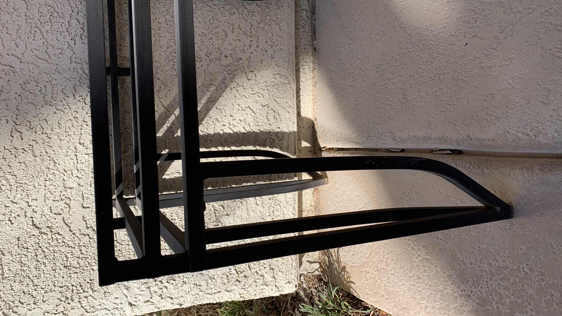 Photo 1 of METAL AND GLASS PATIO END TABLE 31” X 21” H 21”