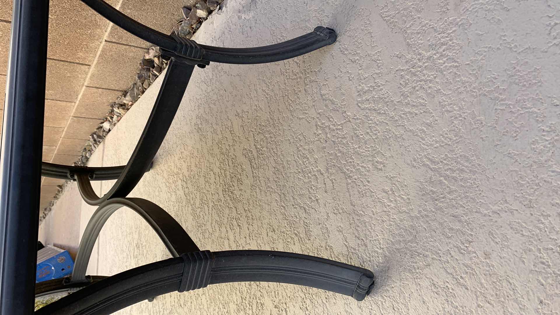 Photo 1 of STONE AND METAL PATIO TABLE 40” X 20” H 17”