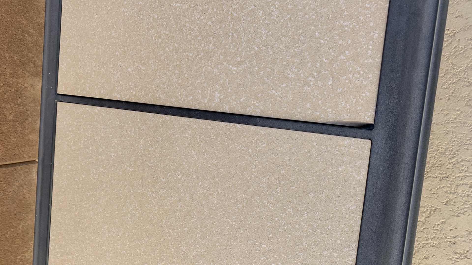 Photo 1 of STONE AND METAL PATIO TABLE 40” X 20” H 17”