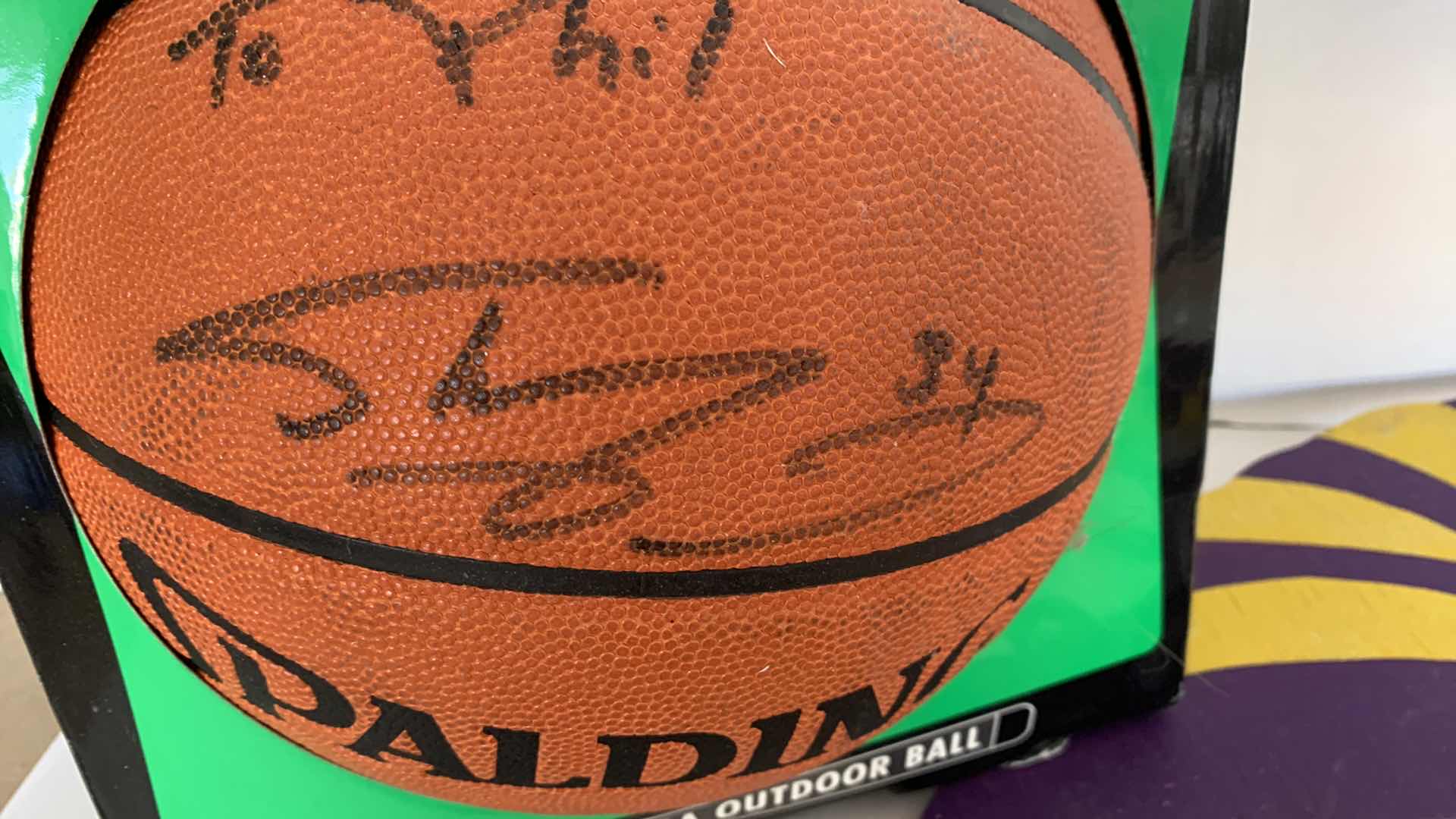Photo 1 of UNAUTHENTICATED SHAQUILLE O’NEAL AUTOGRAPHED BASKETBALL WORLD CHAMPIONSHIP MUG AND LAWN MARKER