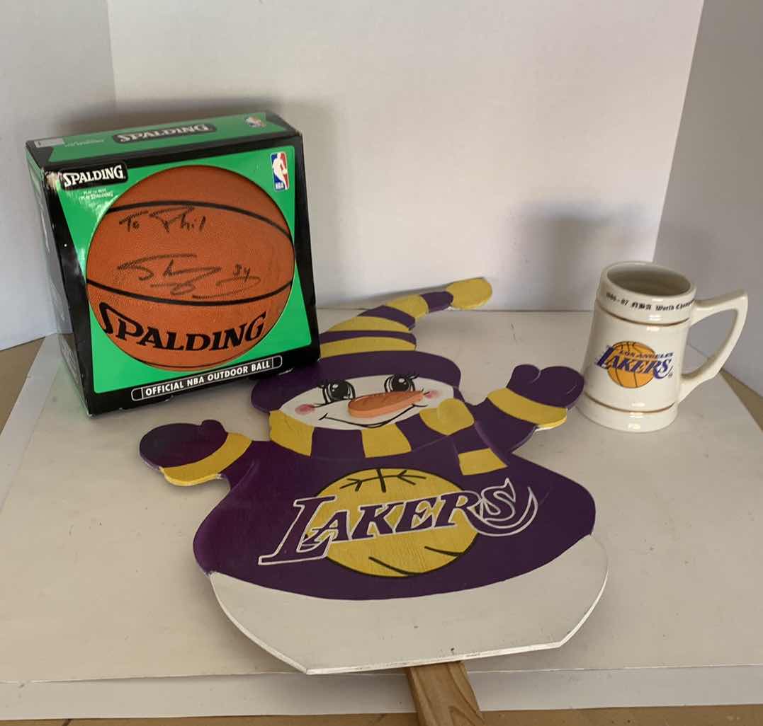 Photo 1 of UNAUTHENTICATED SHAQUILLE O’NEAL AUTOGRAPHED BASKETBALL WORLD CHAMPIONSHIP MUG AND LAWN MARKER