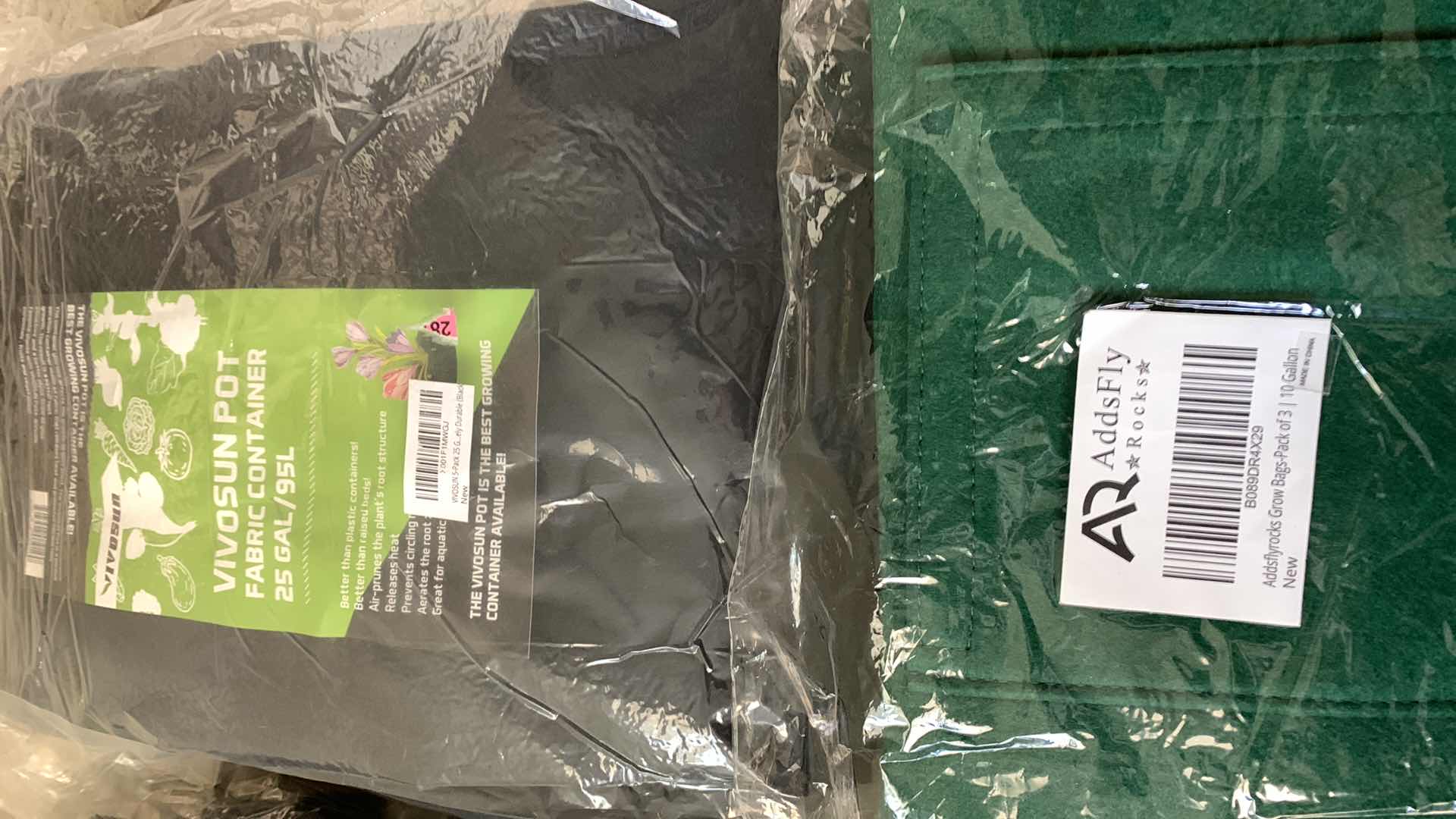 Photo 1 of 3-FABRIC PLANT GROW BAGS AND A LAWN TRACTOR LEAF BAG