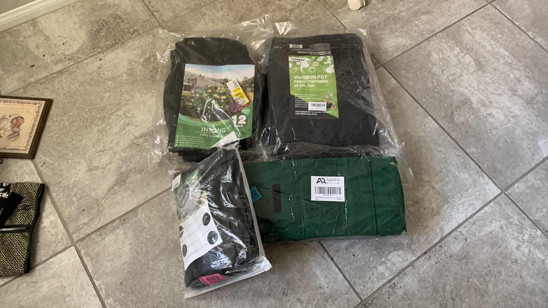 Photo 1 of 3-FABRIC PLANT GROW BAGS AND A LAWN TRACTOR LEAF BAG