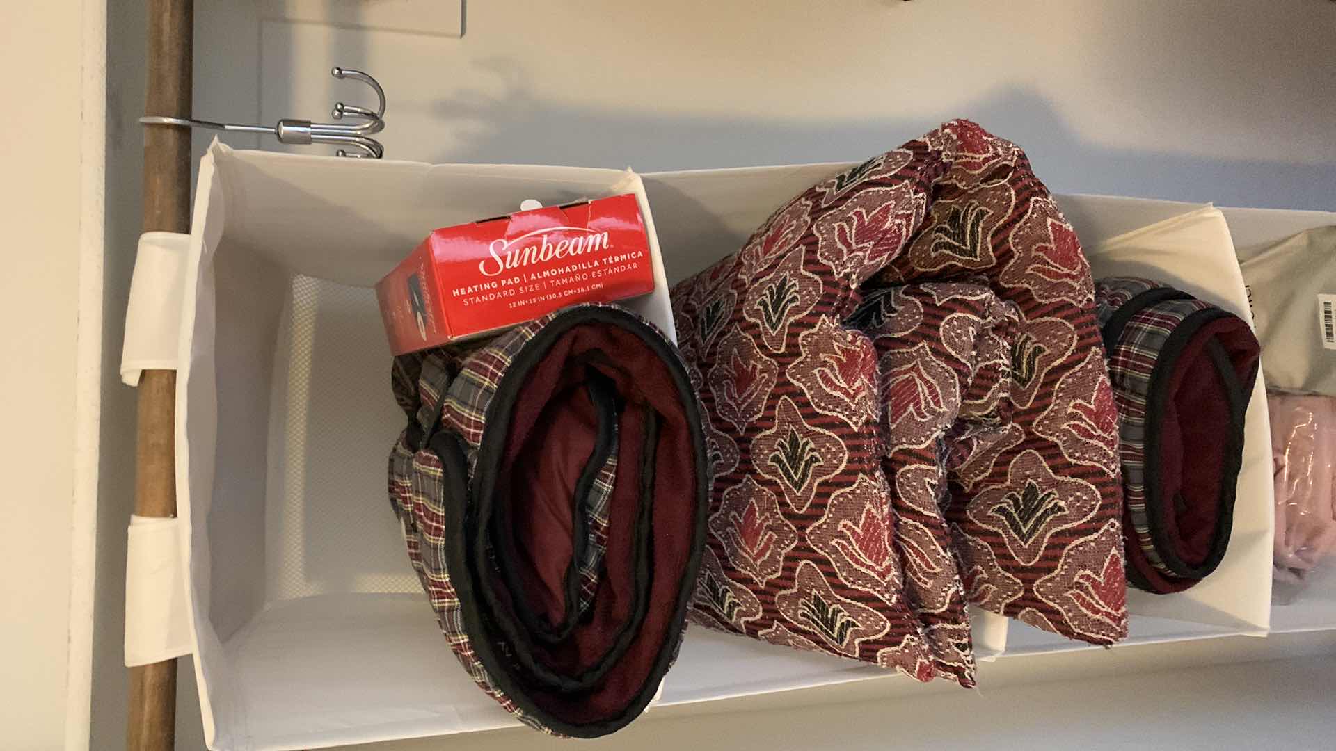 Photo 1 of HANGING STORAGE UNIT WITH HOME ITEMS