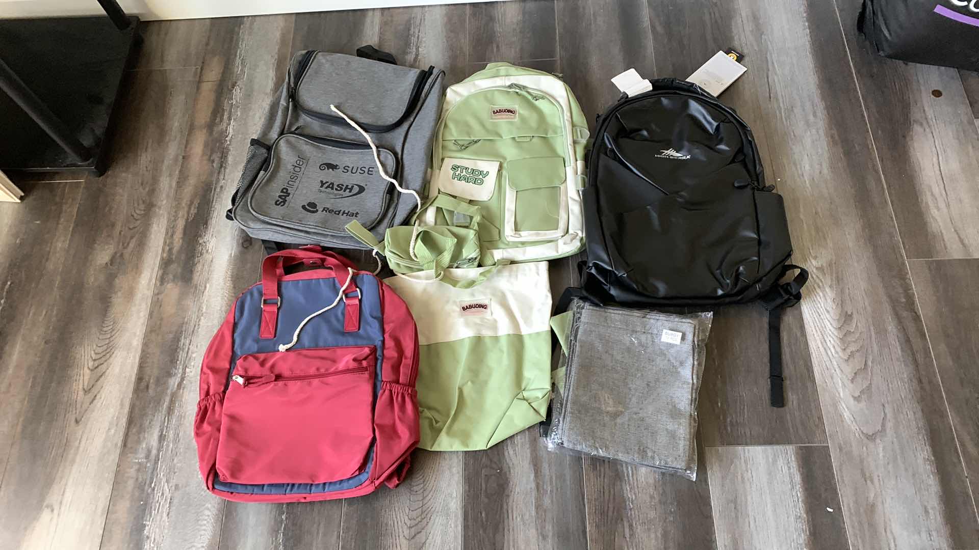 Photo 1 of BACKPACKS AND BAGS