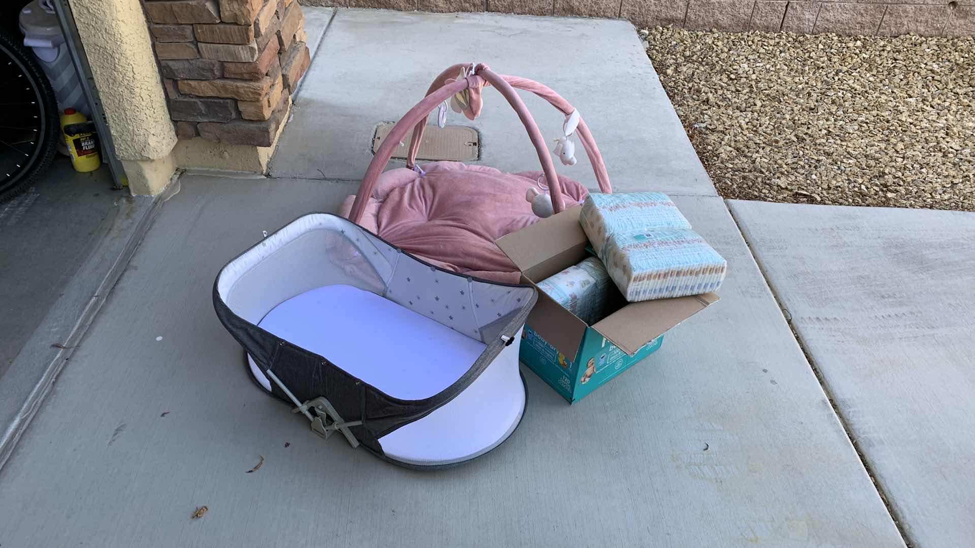 Photo 1 of BASSINET,DIAPERS AND A BABY PLAY LOUNGE