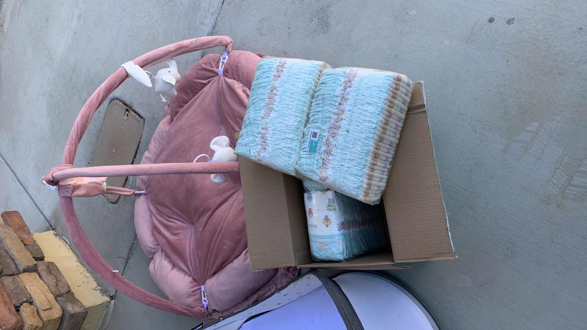 Photo 1 of BASSINET,DIAPERS AND A BABY PLAY LOUNGE