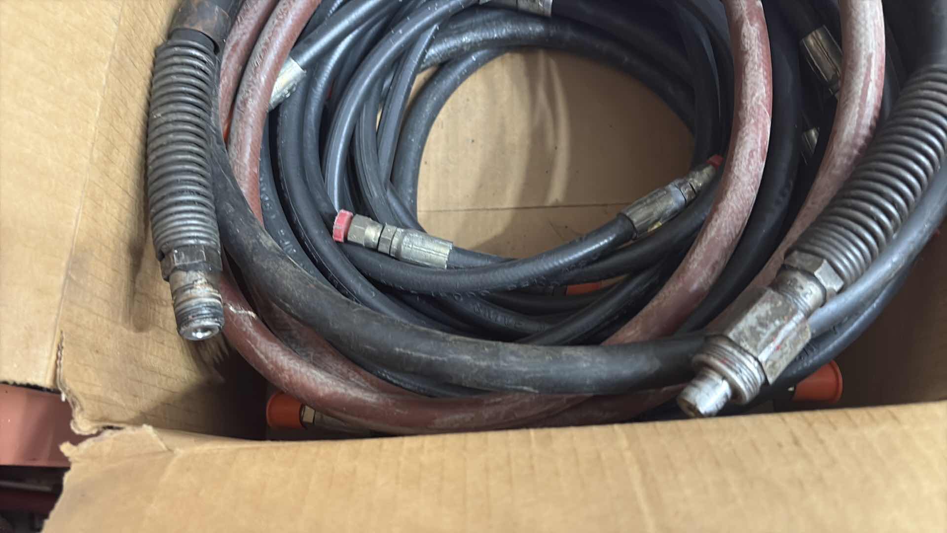 Photo 1 of BOX OF HYDRAULIC HOSES