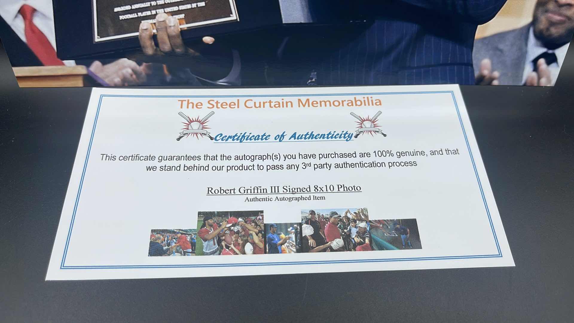 Photo 1 of ROBERT GRIFFIN III 8” X 10” AUTOGRAPHED PHOTO W COA