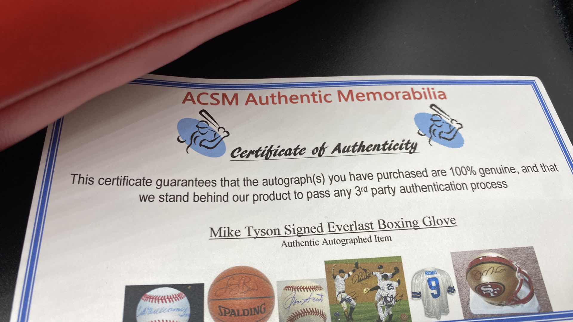 Photo 1 of MIKE TYSON AUTOGRAPHED BOXING GLOVE W COA