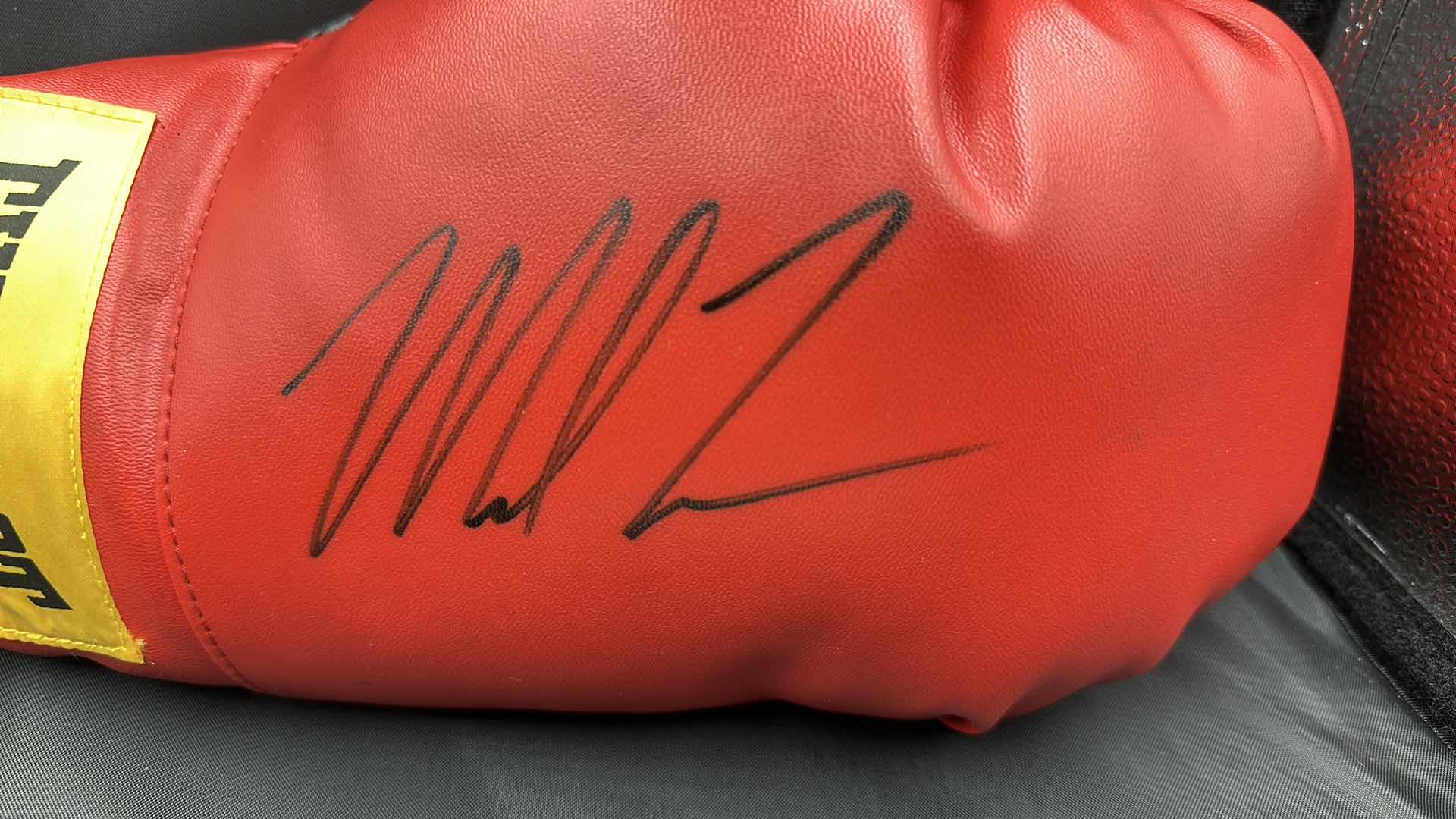 Photo 1 of MIKE TYSON AUTOGRAPHED EVERLAST BOXING GLOVE W COA