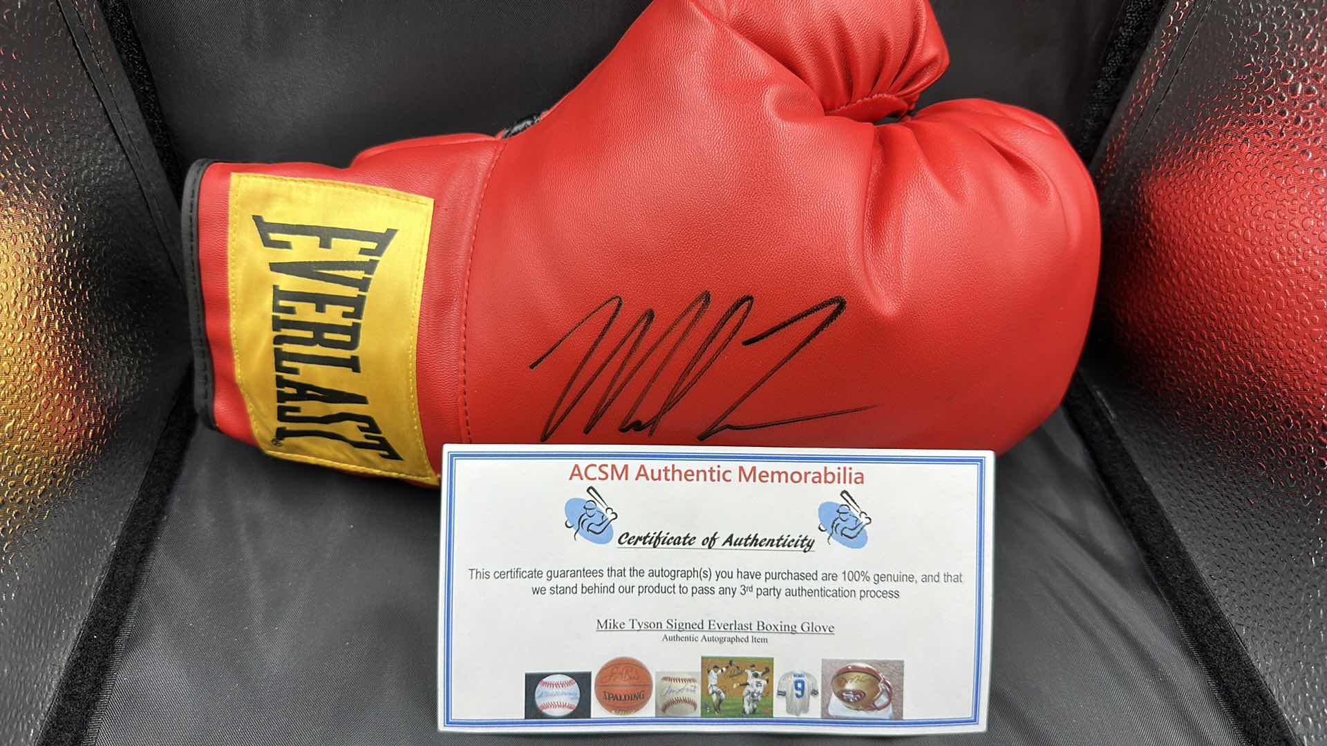 Photo 1 of MIKE TYSON AUTOGRAPHED EVERLAST BOXING GLOVE W COA