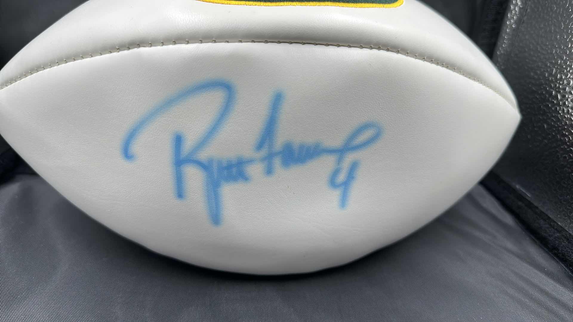 Photo 1 of BRETT FAVRE AUTOGRAPHED PACKERS FOOTBALL AUTHENTICITY VERIFIED BY THE SELLER