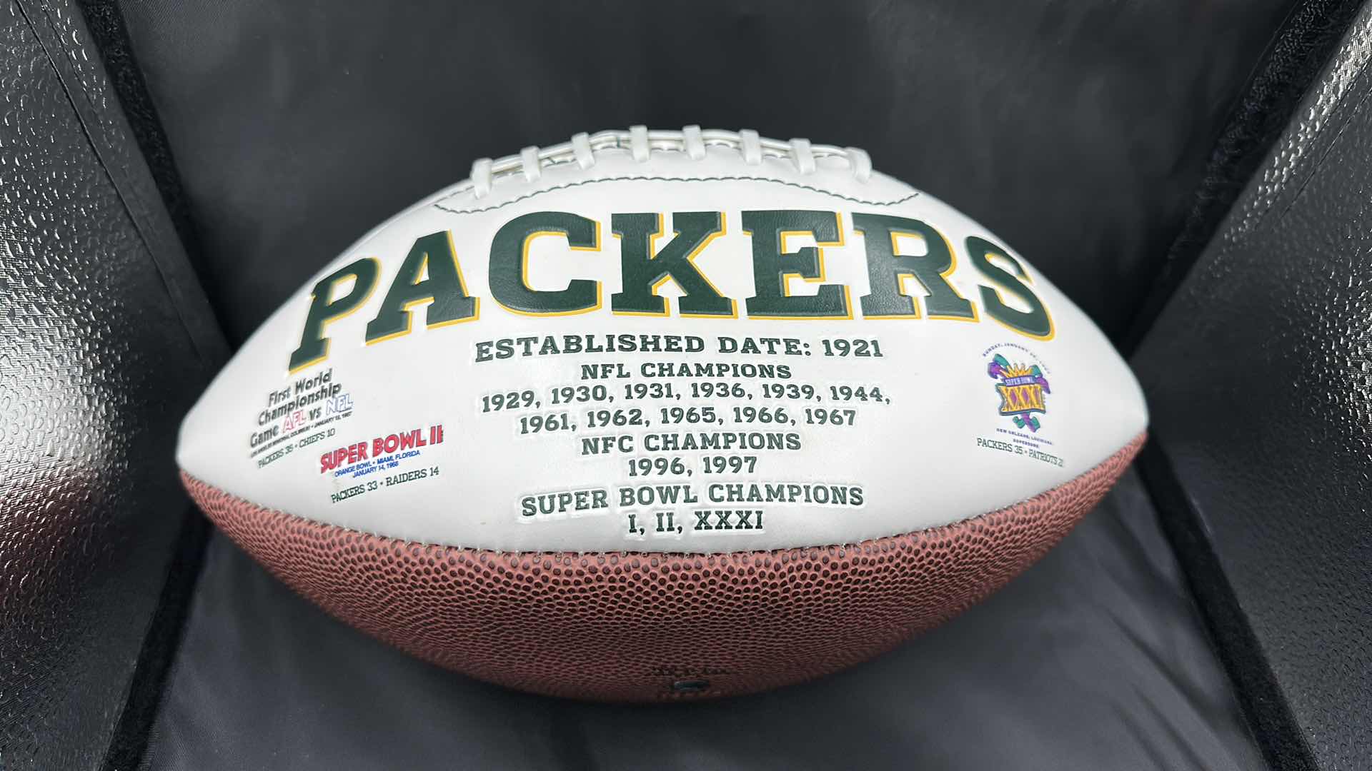 Photo 1 of BRETT FAVRE AUTOGRAPHED PACKERS FOOTBALL AUTHENTICITY VERIFIED BY THE SELLER