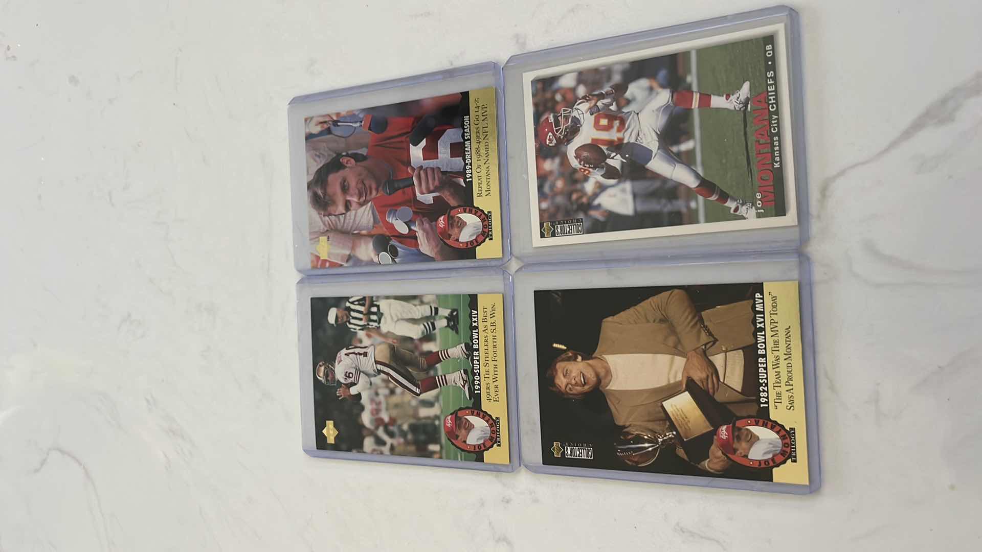 Photo 1 of Assorted joe Montana football cards