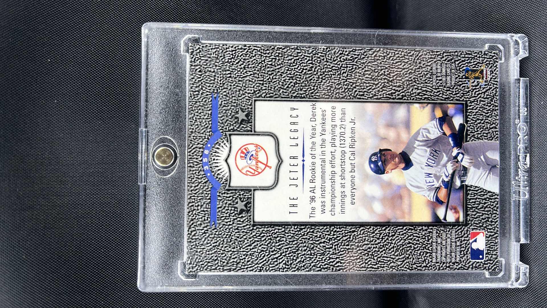 Photo 1 of 1997 leaf Don Russ rookie Derek Jeter