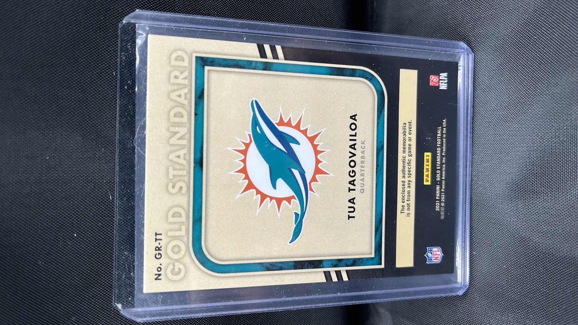 Photo 1 of 2021 panini gold standard tua tugovailoa jersey piece 049