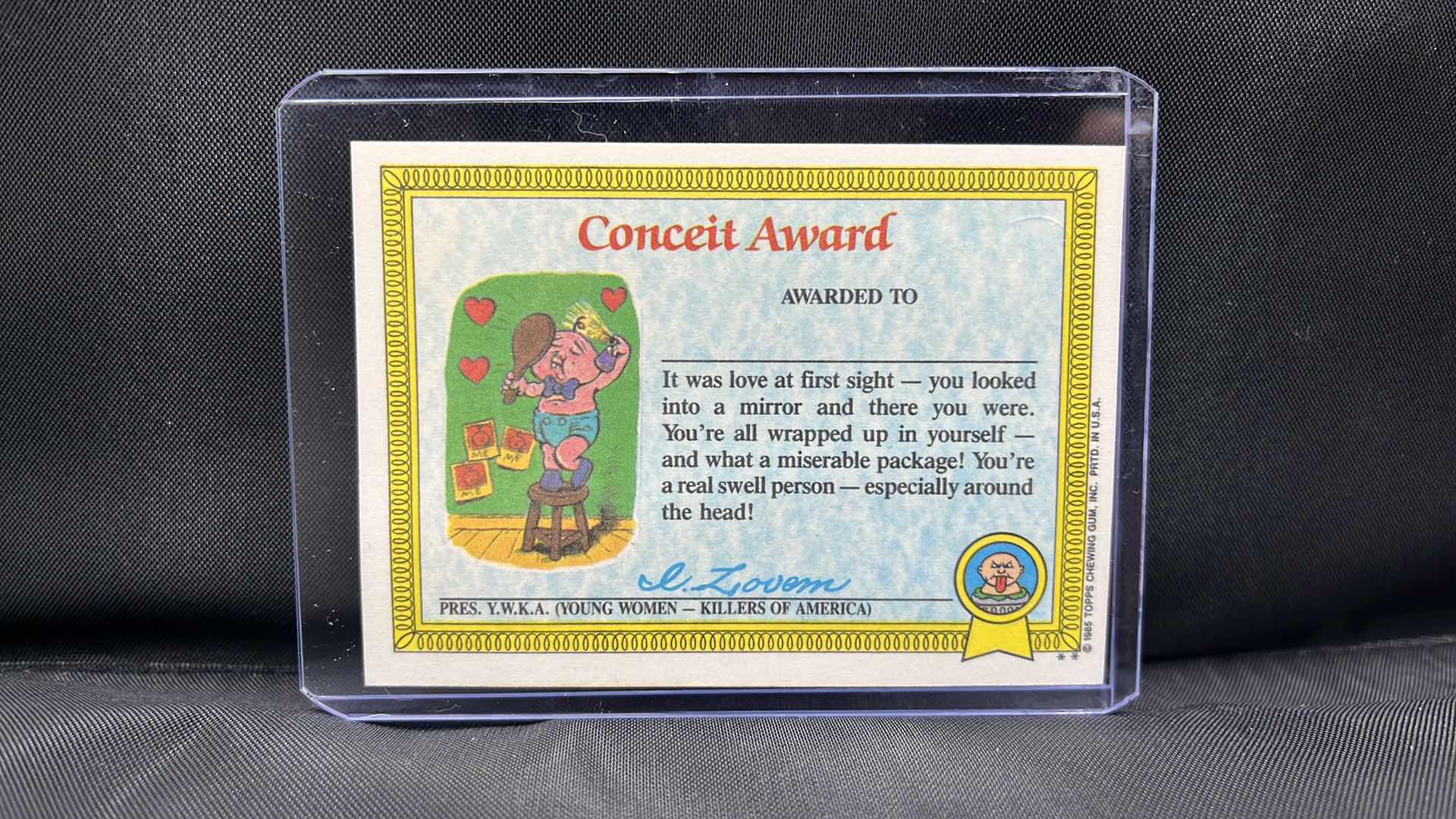 Photo 1 of 1985 Topps Garbage Pail Kids Series 1 Nerdy Norm Matte back OS1 #24b