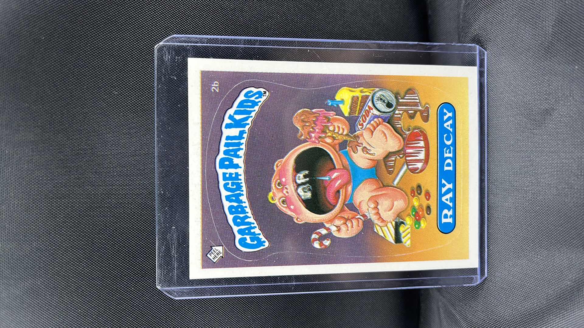 Photo 1 of 1985 TOPPS GARBAGE PAIL KIDS GPK RAY DECAY 2b