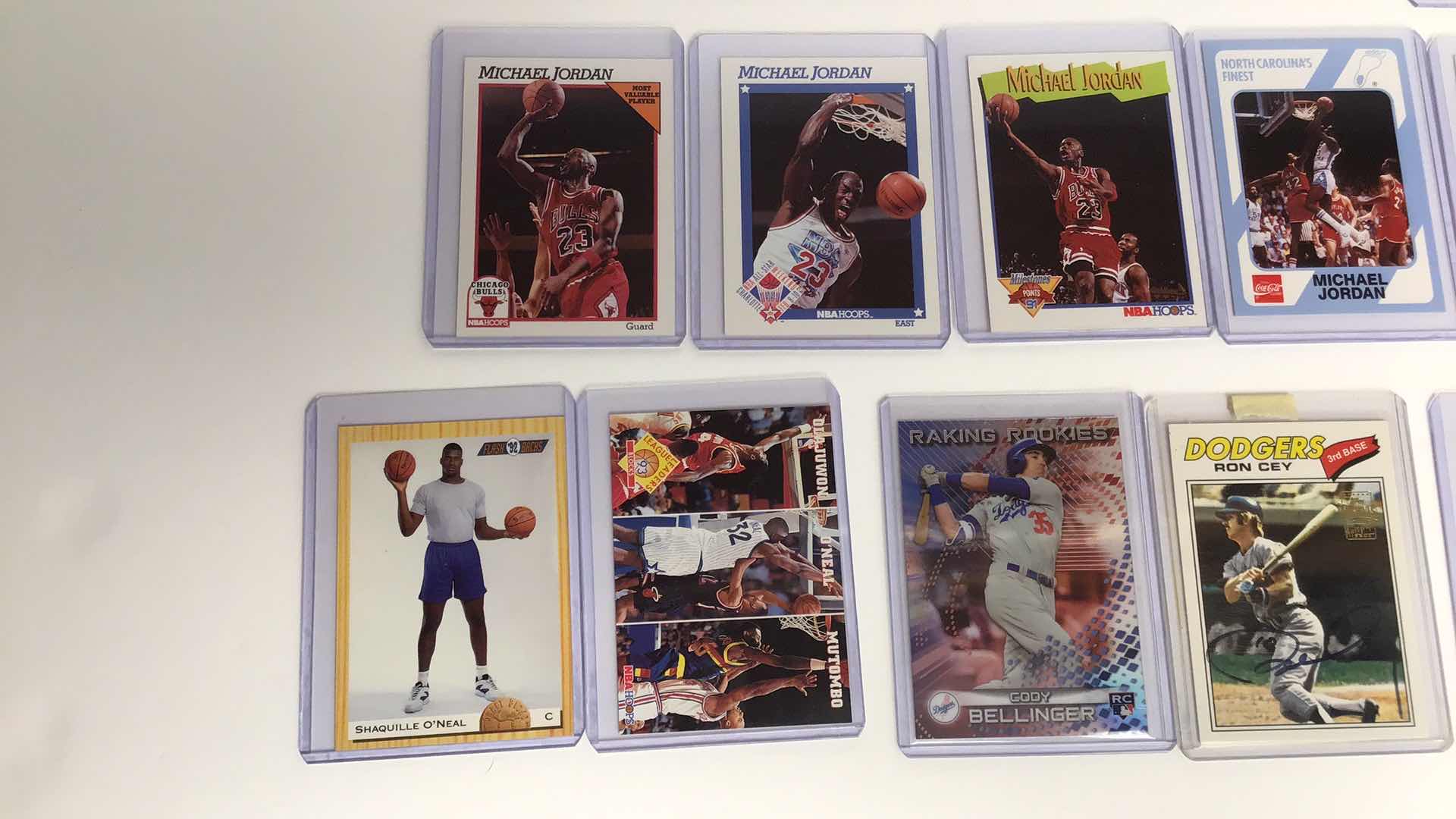 Photo 1 of $40 LOT OF 16 MISC SKYBOX CARDS IN SLEEVES NBA, NFL, MLB*
