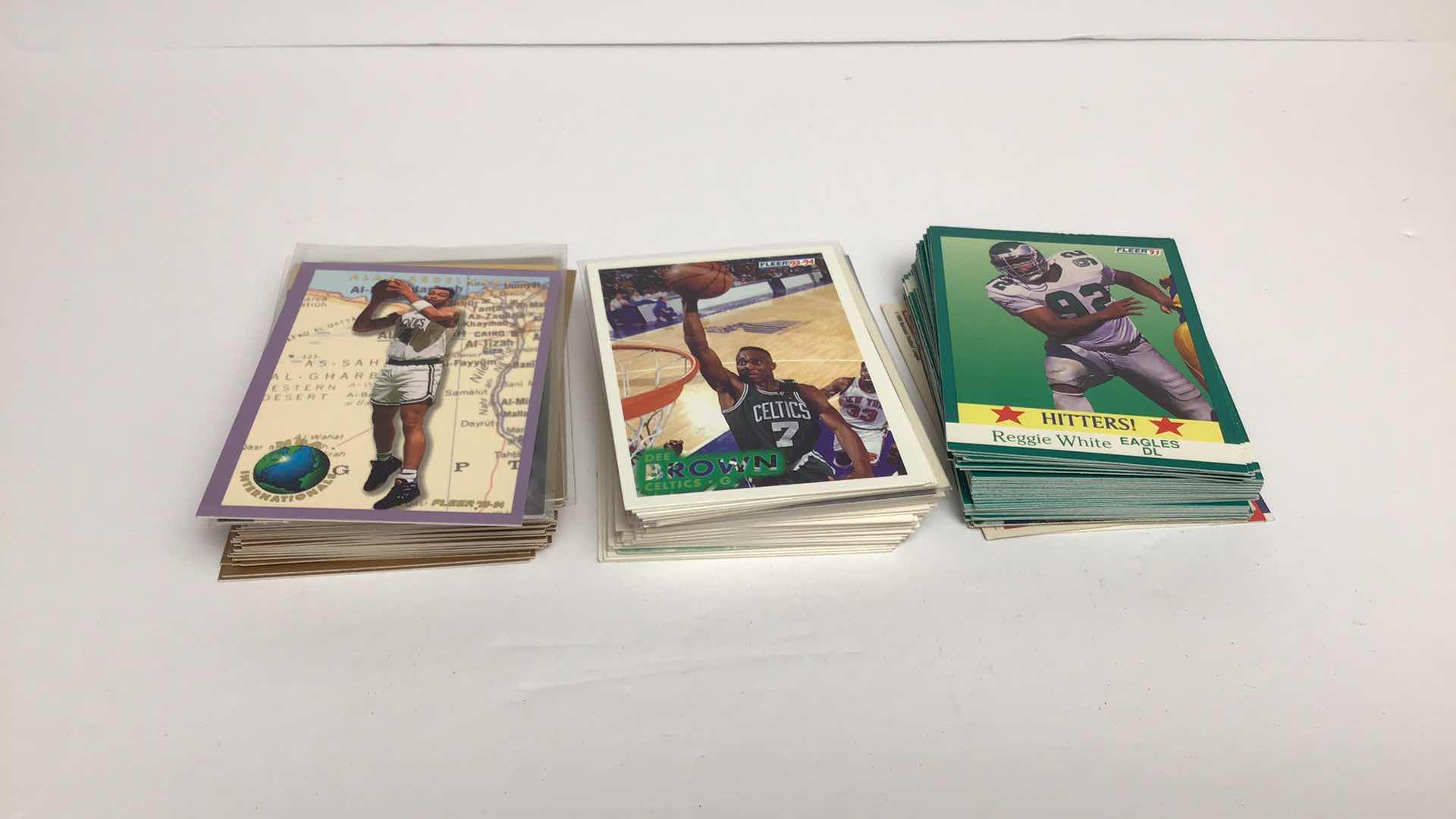 Photo 1 of $50 LOT OF APPROX 125 FLEER CARDS NBA/NFL 1990S*