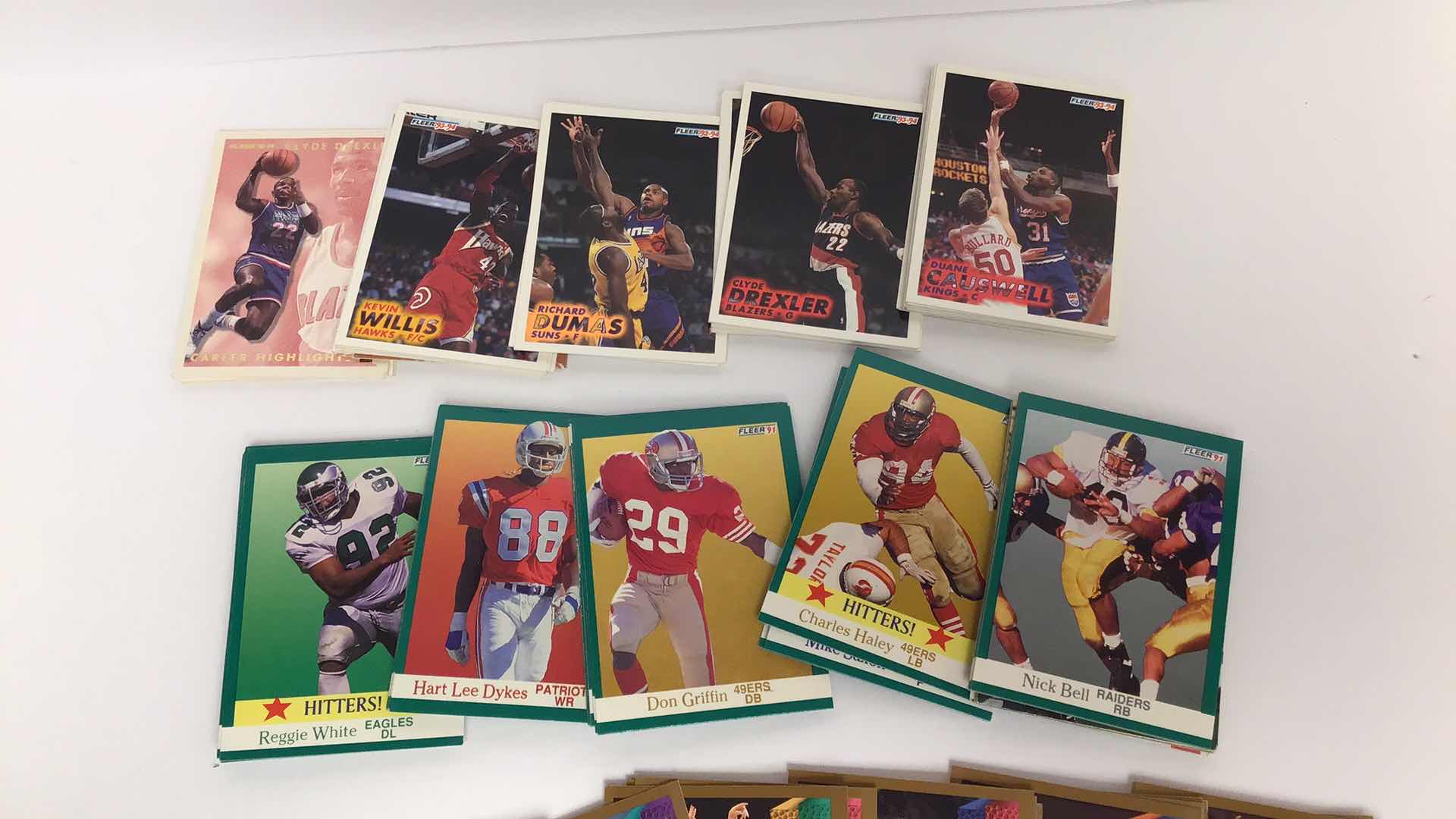 Photo 1 of $50 LOT OF APPROX 125 FLEER CARDS NBA/NFL 1990S*
