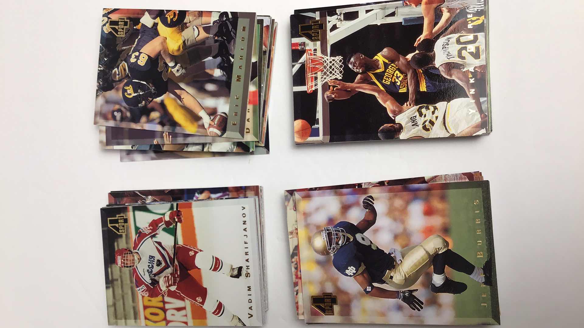 Photo 1 of $75 1994 FOUR SPORT COLLECTION MLB, NFL, NBA, NHL APPROX 200 CARDS (100 SEALED)*