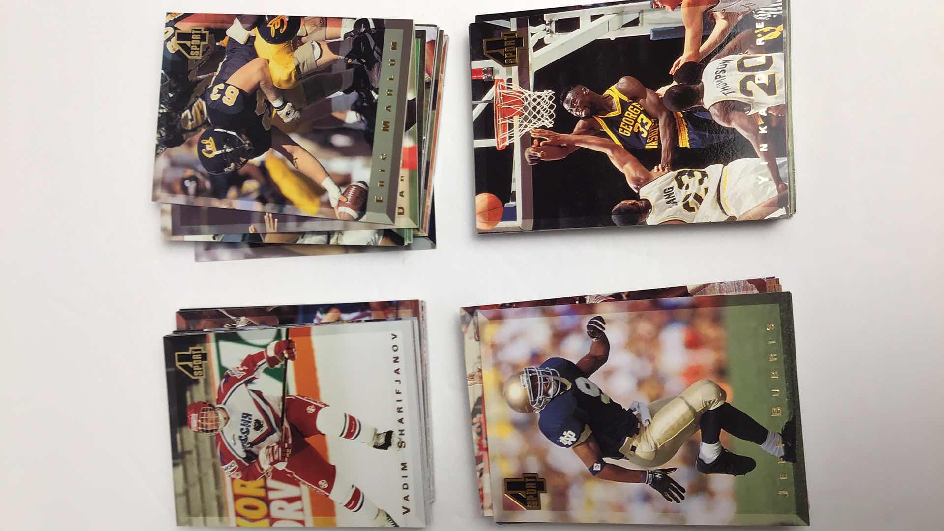Photo 1 of $75 1994 FOUR SPORT COLLECTION MLB, NFL, NBA, NHL APPROX 200 CARDS (100 SEALED)*