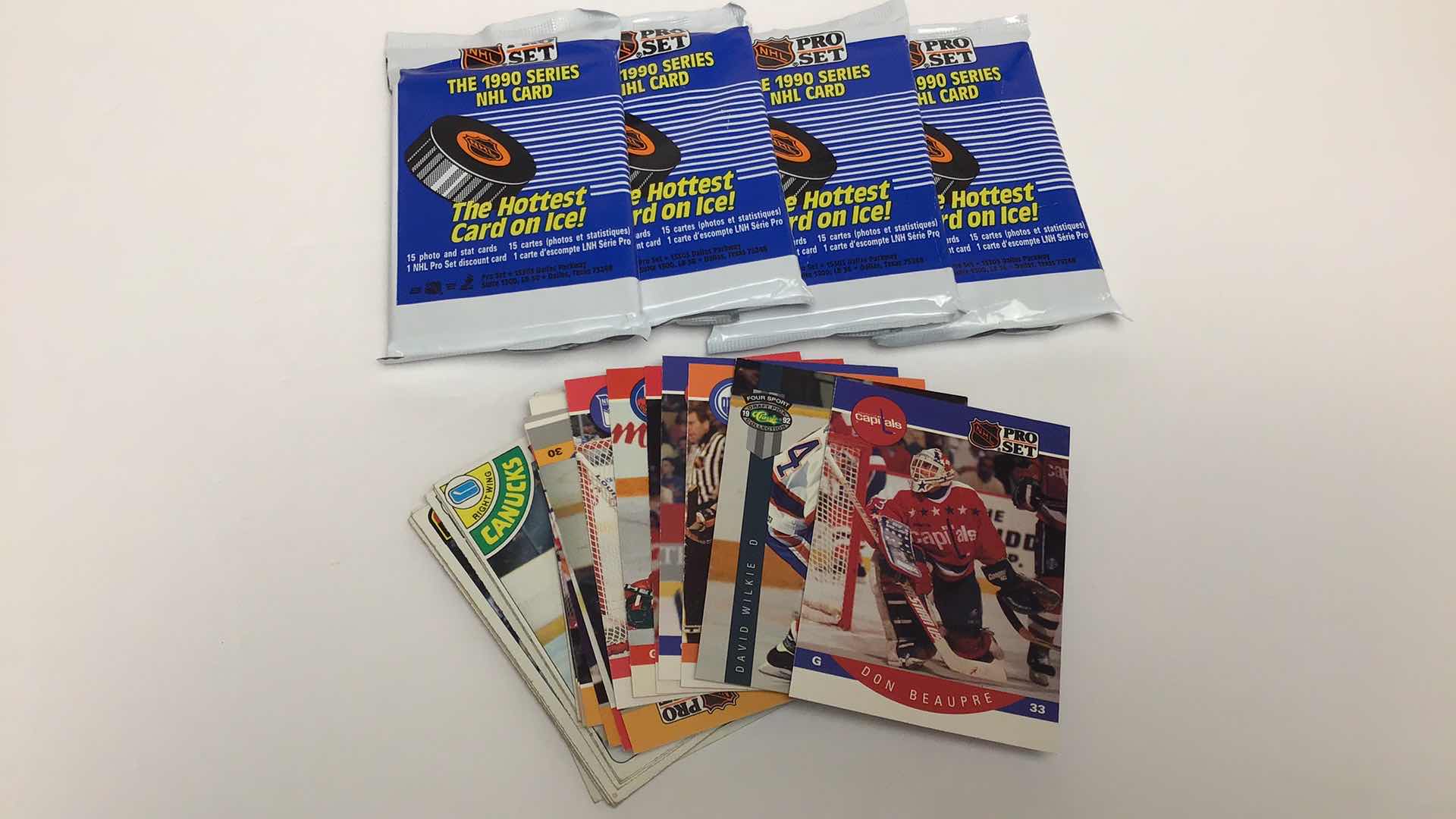 Photo 1 of $30 4 SEALED NHL PRO SET 1990 TRADING CARDS AND 20 LOOSE CARDS*