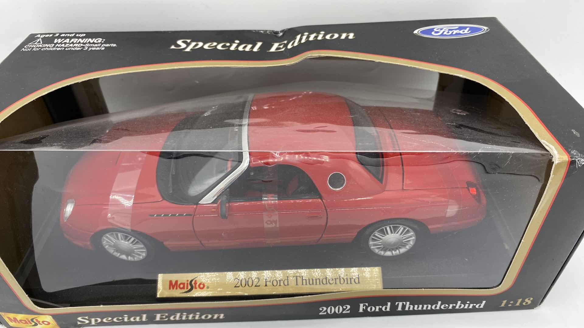 Photo 1 of PAIR OF MAISTO MODELS 2002 THUNDERBIRD & CHRYSLER PT CRUISER SCALE 1:18