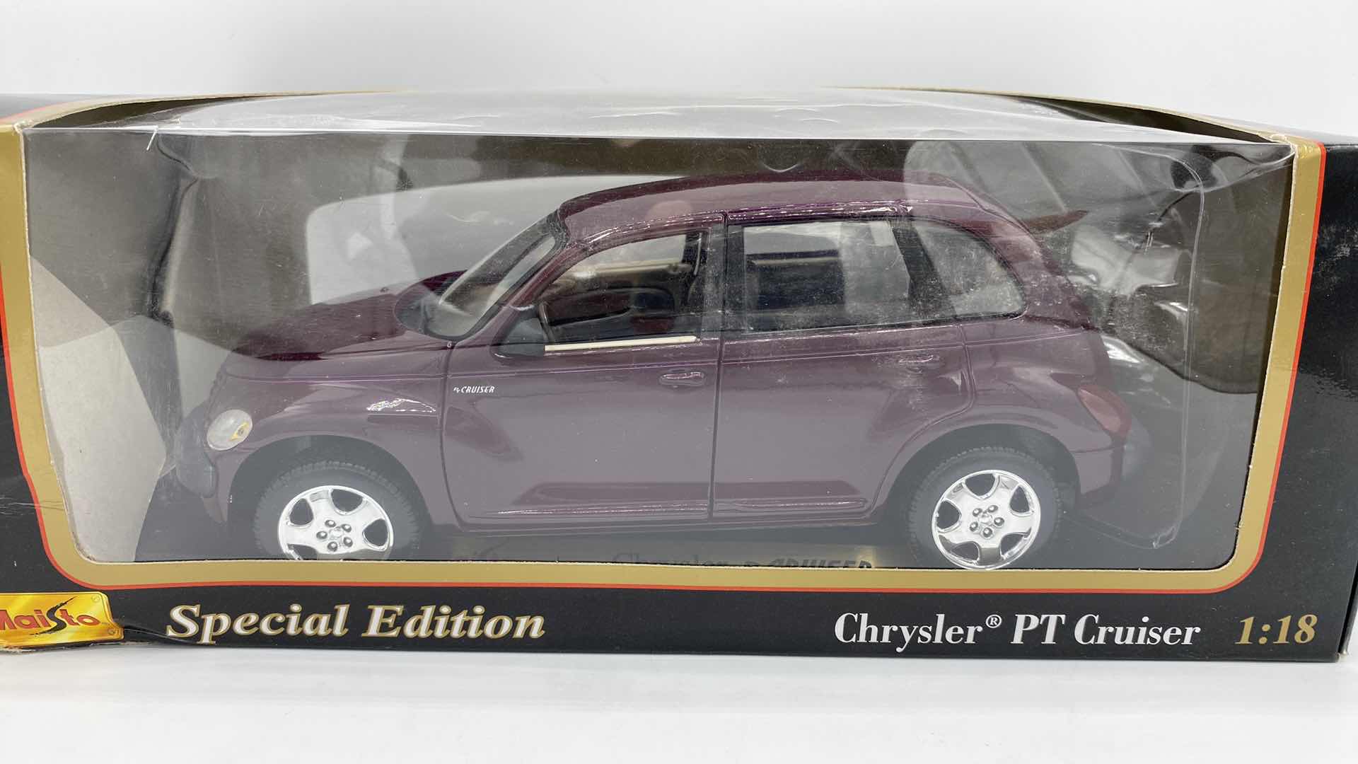 Photo 1 of PAIR OF MAISTO MODELS 2002 THUNDERBIRD & CHRYSLER PT CRUISER SCALE 1:18