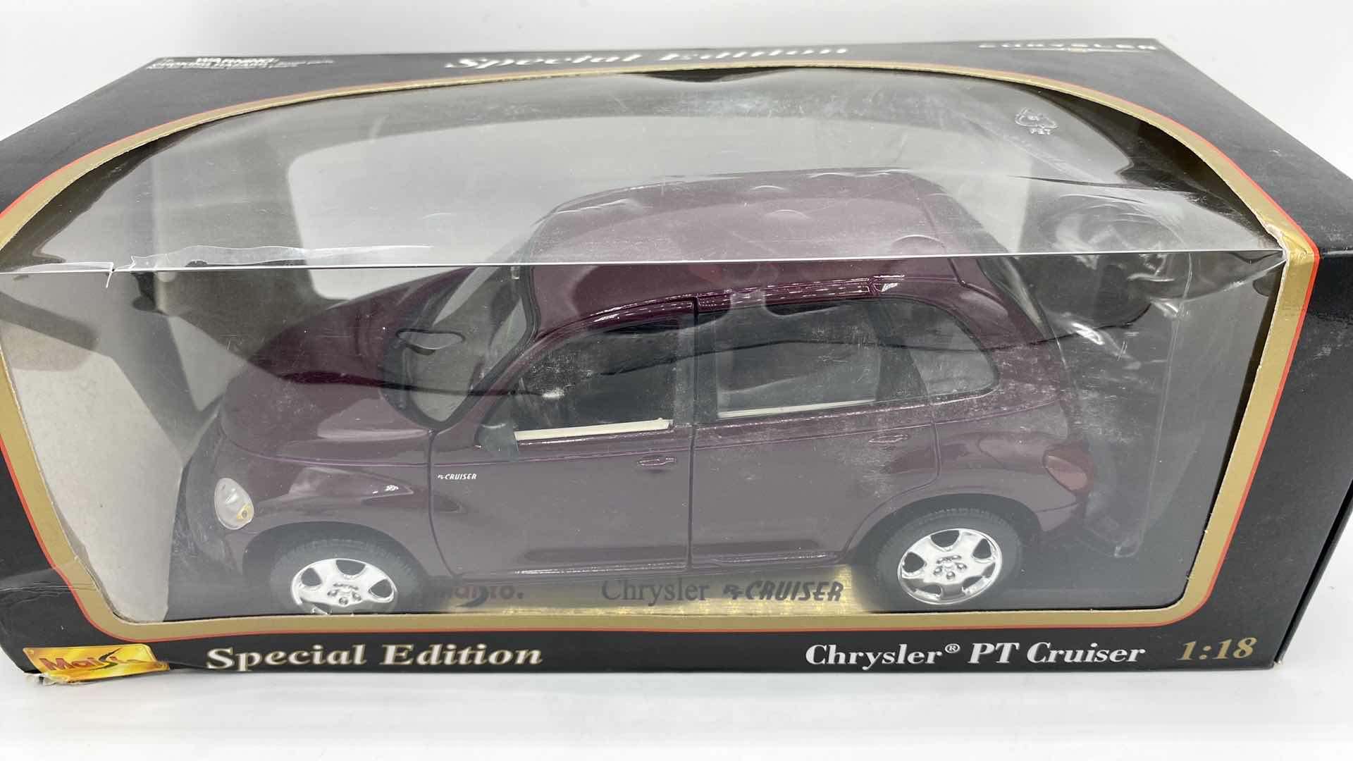 Photo 1 of PAIR OF MAISTO MODELS 2002 THUNDERBIRD & CHRYSLER PT CRUISER SCALE 1:18