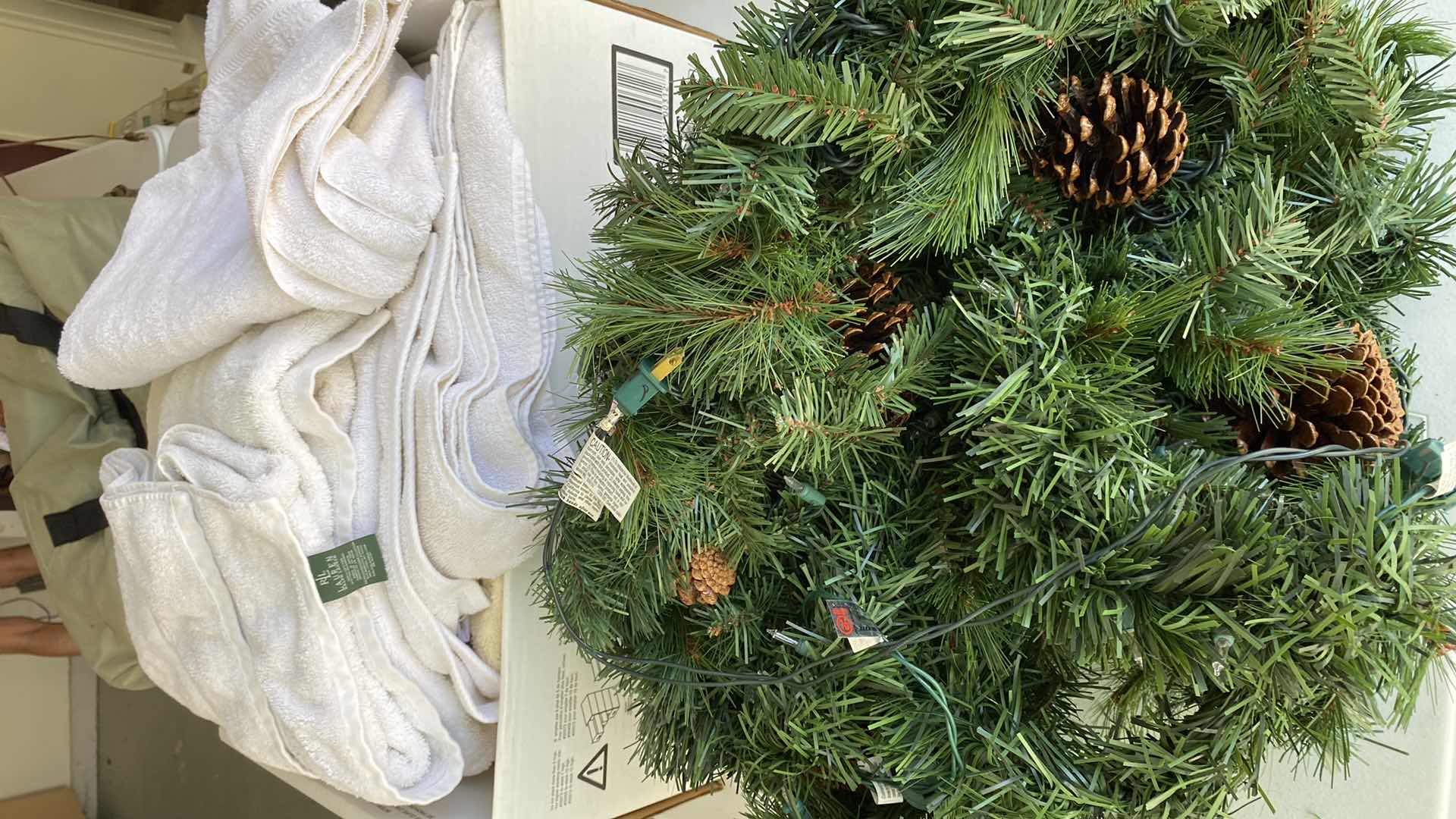 Photo 1 of CHRISTMAS LIGHTED GARLAND AND BOX OF TOWELS