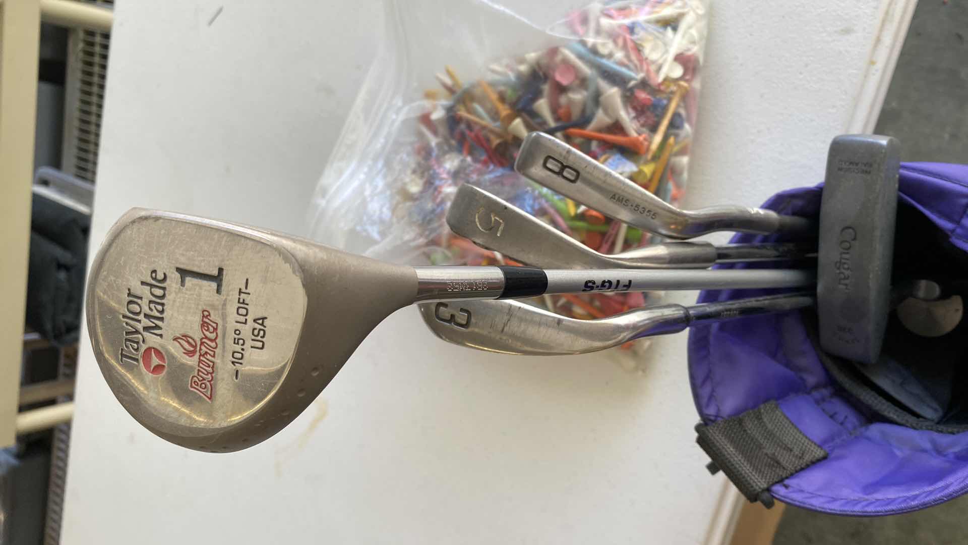 Photo 1 of GOLF BAG CLUBS BALLS AND TEES